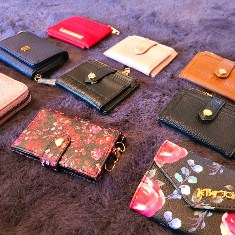 FREE mystery wallet with each $100 purchase!